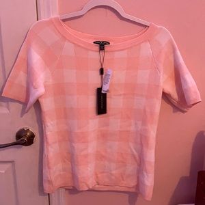 Pink and white plaid shirt